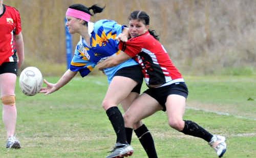 Twin sisters Jen Whitfield and Bec Briggs fight it out during the women’s league match at Jack Stokes Oval. Twin sisters Jen Whitfield and Bec Briggs fight it out during the women’s league match at Jack Stokes Oval.
